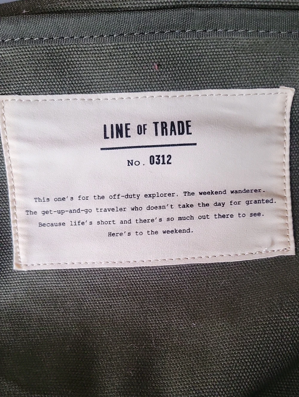 Line of Trade green military duffle sack with brown canvas strap